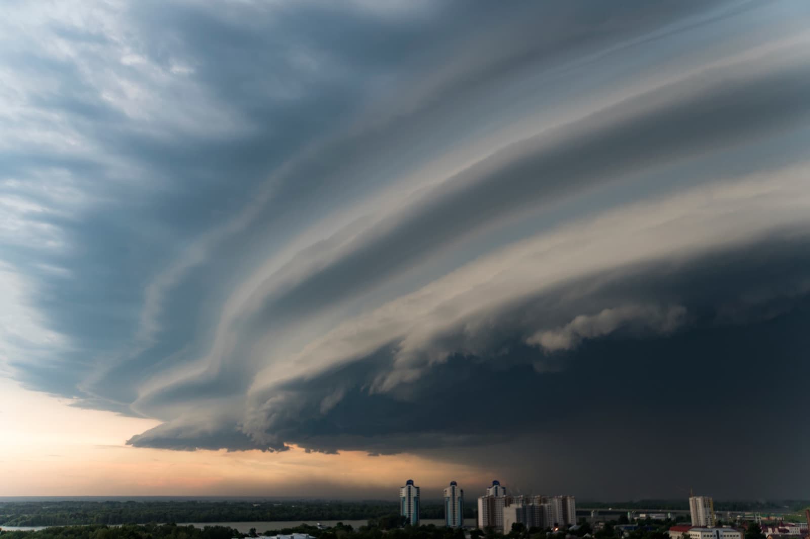 Severe storm front moving over a Gulf Coast city skyline
